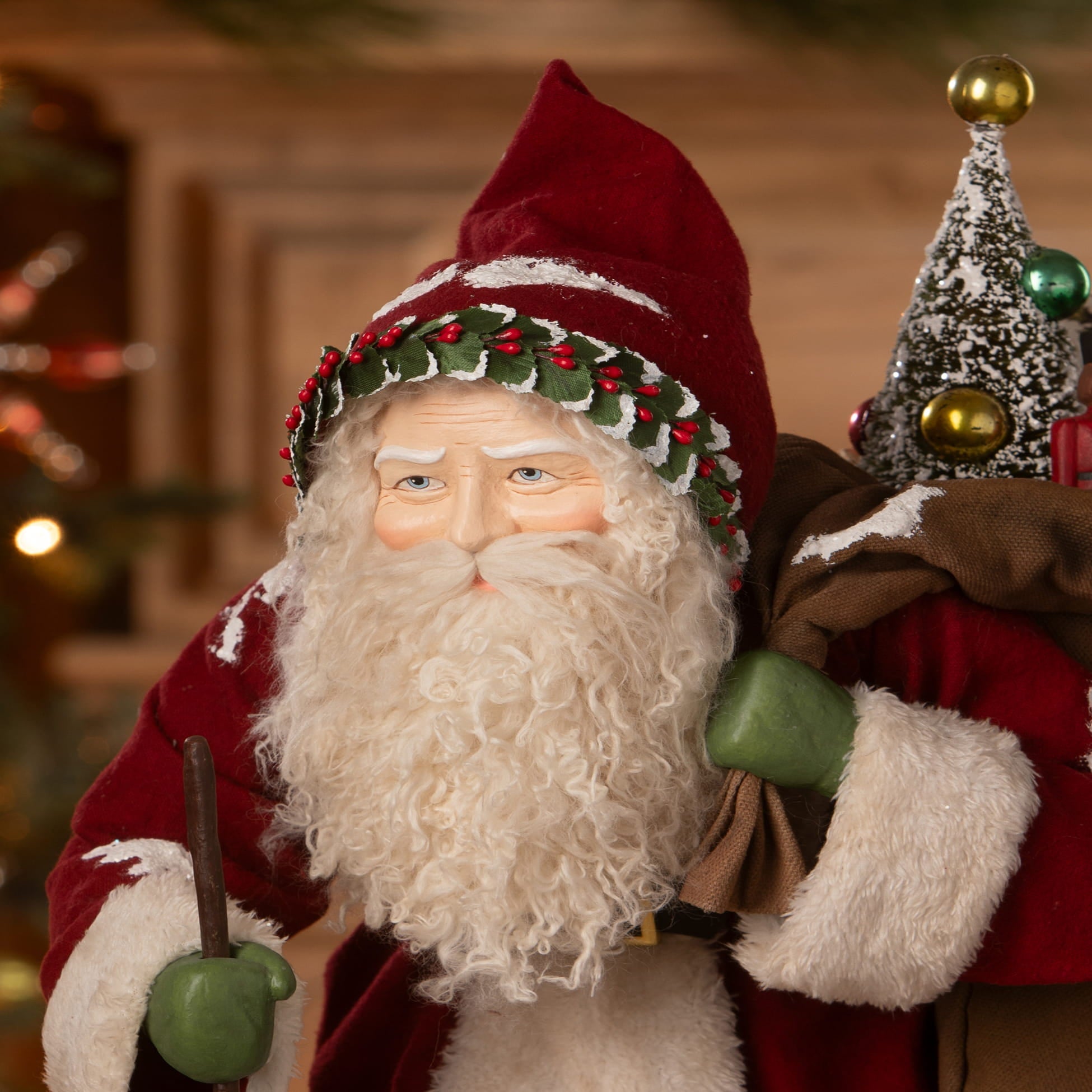 Red velvet st. nick santa figure from bethany lowe designs with white beard green gloves staff and bag of toys