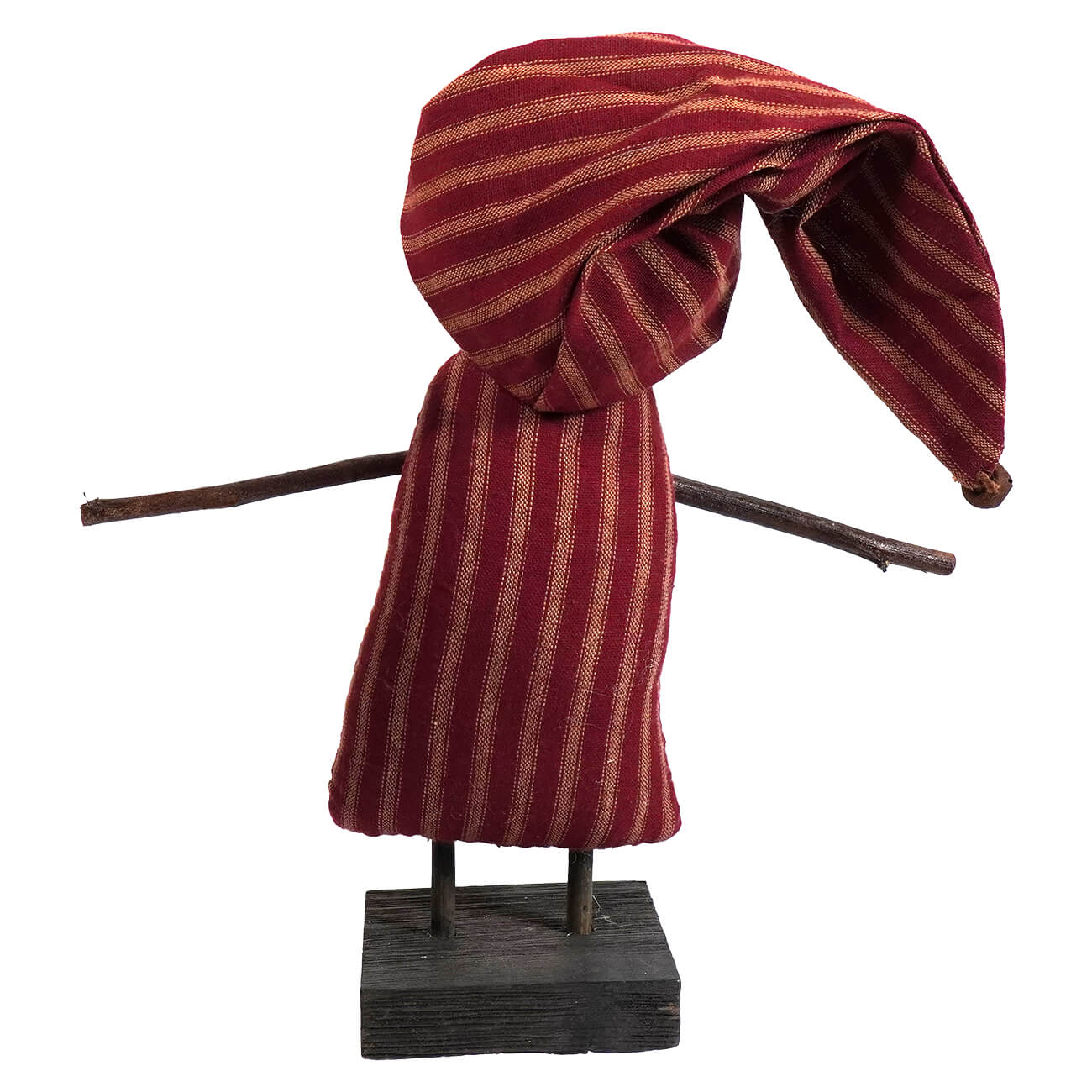 A rustic primitives by kathy ole st nick standing doll with red and beige striped fabric and twig limbs on a wooden base