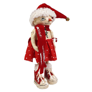 A charming olympia flake christmas snowman figure by bethany lowe designs wearing a red santa hat and polka dot dress