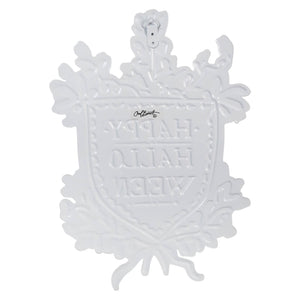 Ornate white decorative plaque with embossed text reading ’MATER ALLAH BOX’.