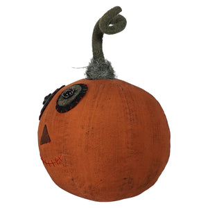 Orange canvas rustic pumpkin with stitched face and dark green twisted stem made of canvas fabric