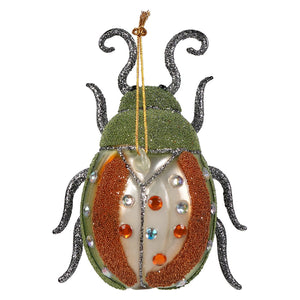 A sparkling green and orange glass beetle ornament with glittery black legs and colorful rhinestones bug ornament