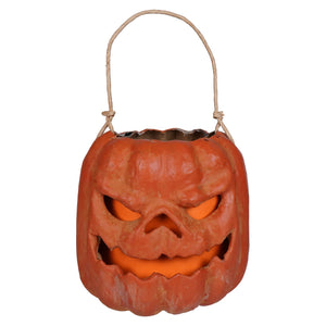 Orange scary face plastic halloween pumpkin bucket with raggedy junction design and handcrafted folk art hanging twine handle