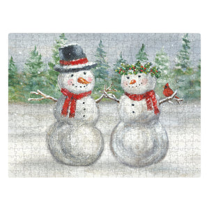A completed snow family puzzle showing two snowmen in a snowy forest, perfect vintage santas puzzle for christmas fun