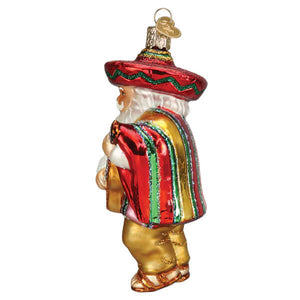 Glass papa noel ornament santa ornament wearing red sombrero with green trim and colorful striped poncho outfit santa ornament