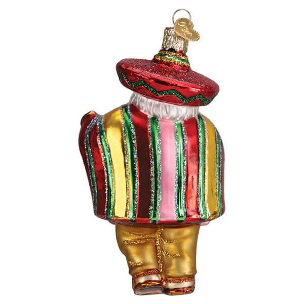 Festive papa noel ornament with a glass santa ornament wearing a red sombrero and gold pants in vibrant stripes
