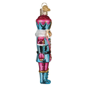 Pastel nutcracker ornament vibrant pink and teal glass nutcracker general ornament with glittery details for tabletop decor