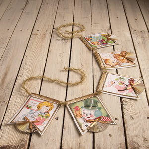 A pastel retro garland by bethany lowe design with vintage christmas cards gold glitter trim and golden tinsel cord