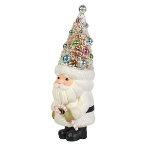 A festive pastel tree santa gnome figurine by bethany lowe design with a glittery christmas tree hat holding a candy cane