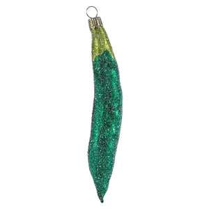 A sparkling green glass pea pod ornament with gold tip and loop perfect for figural decor or lighted decor