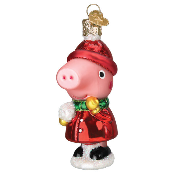 Peppa pig with snowball ornament is a pink glass toy with a red glittery hat green scarf and black boots for fun miscellaneous ornaments