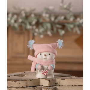 A charming white peppermint blush snowgirl figurine by bethany lowe designs with a pink glittery hat and peppermint candy