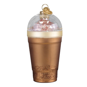 Clear glass peppermint mocha ornament shaped like a coffee cup with gold base white foam and red sprinkles perfect whipped coffee ornament tabletop decor or figural decor