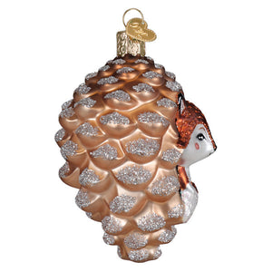 Delicate glass pinecone ornament with coppery sheen and fox peek perfect figural decor or tree topper