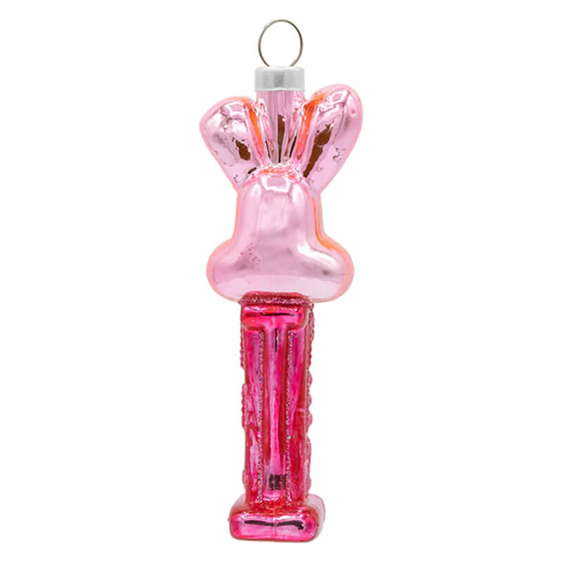 Pink easter bunny mini pez© dispenser ornament with a pink glass bell shape glittery base and silver hanging loop