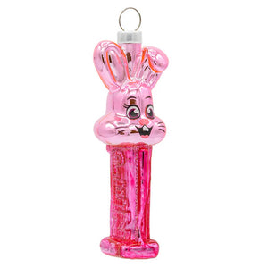 Pink easter bunny bunny mini pez© dispenser ornament made of translucent pink glass with glittery texture and detailed face