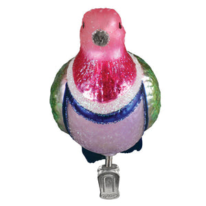 Pink fruit dove ornament is a pink and green glass pigeon ornament with glittery details and a silver clip base for tree toppers or figural decor