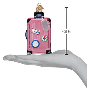 Pink rolling glass suitcase ornament with black trim glittery wheels and paris and i heart ny travel stickers