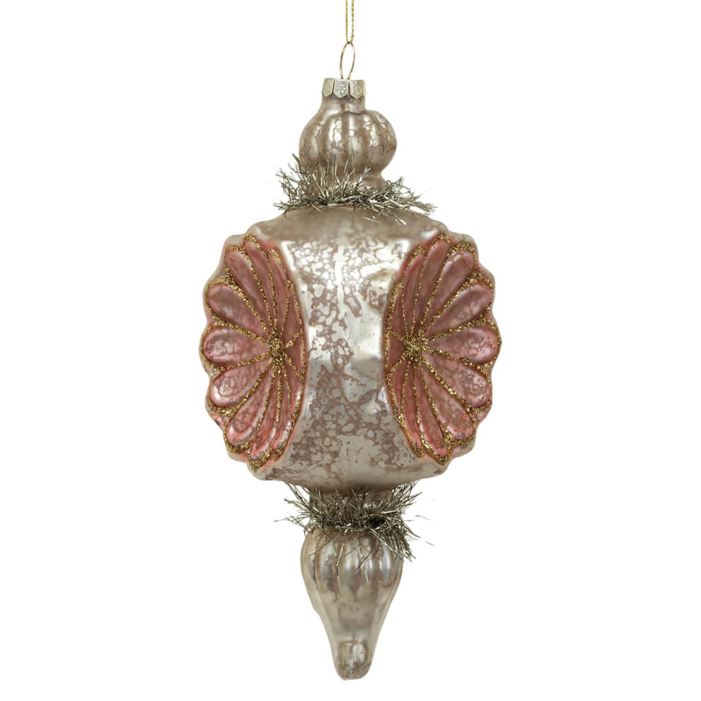 Ornate glass Christmas tree ornament with silver and pink accents.