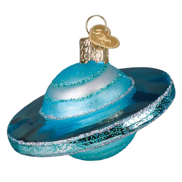 A translucent blue glass planet uranus ornament with glittery rings silver accents and a gold heart-shaped tag christmas glass ornament