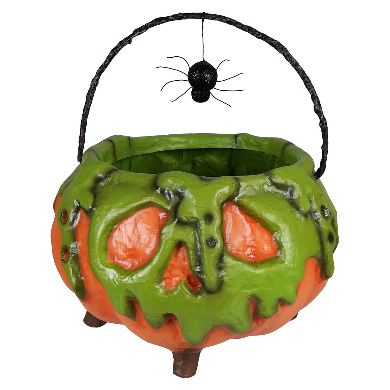 Poison pumpkin cauldron filled with colorful halloween candy and a decorative black spider on the side