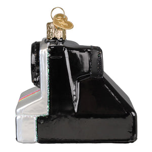 Black and silver glass camera ornament shaped like vintage polaroid instant camera with gold keychain topper for figural decor