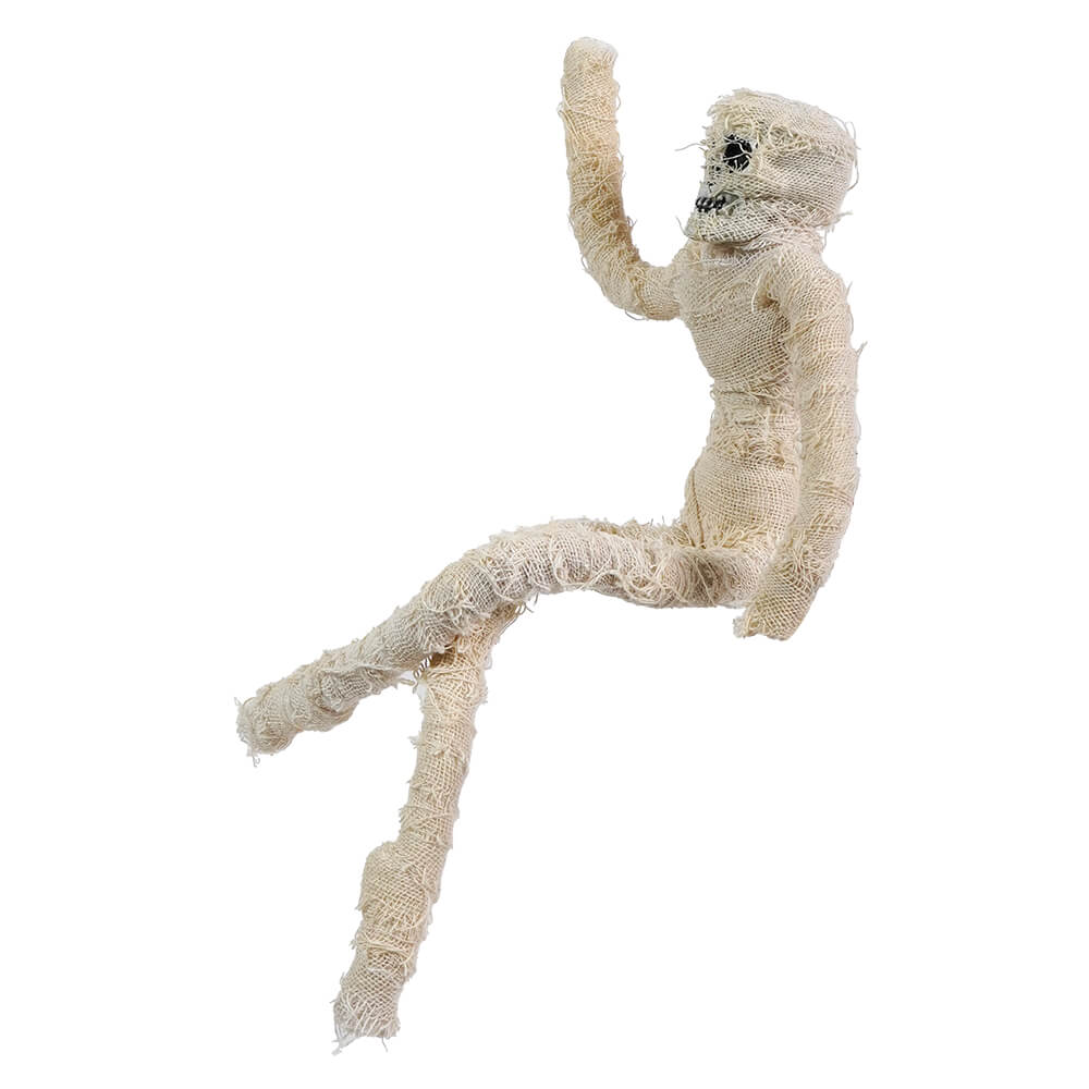 White, fluffy stuffed monkey toy with long limbs in a playful pose.