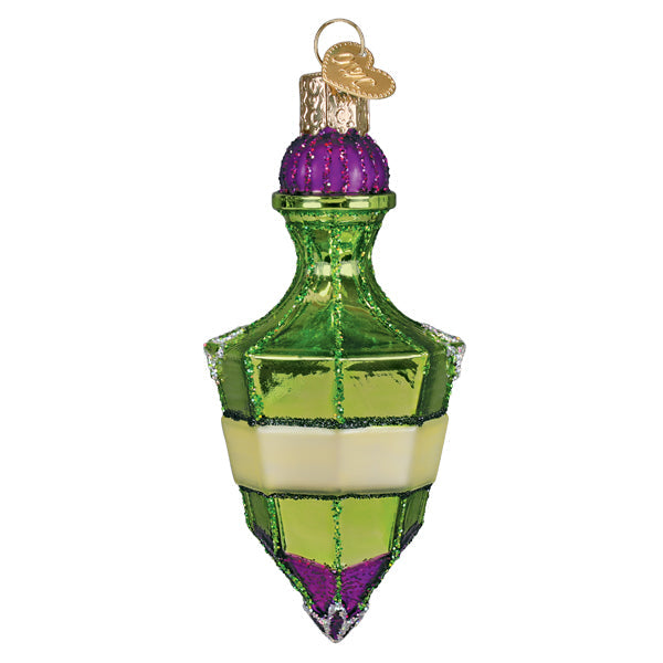 A festive green and purple glass potion bottle ornament with glittery accents perfect as halloween cauldron ornament or tabletop decor