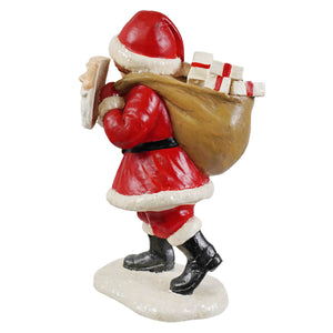 Pretending to be santa red and white bethany lowe designs santa figure with brown gift sack on snowy base folk art santas