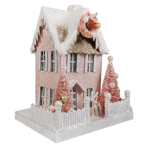 Pink glittery bethany lowe christmas cottage figurine with snow dusted roof gold accents and pearl decorated trees
