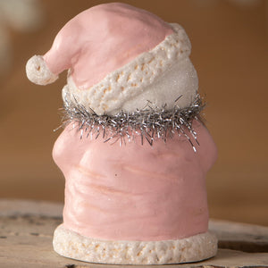 Pretty in pink snowgirl figurine with pink santa hat and silver tinsel trim from bethany lowe designs christmas snowman figures & decor