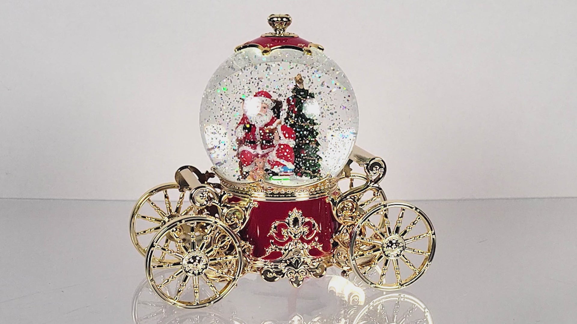 Lighted Musical Spinning Water Globe Santa Carriage