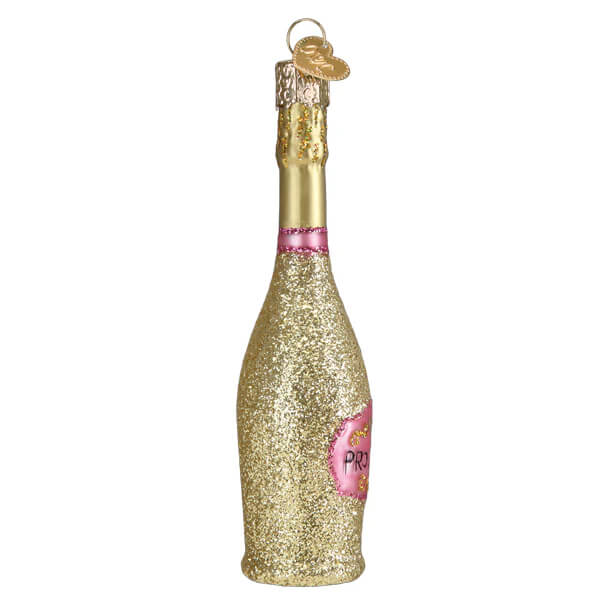 A glittery gold prosecco bottle ornament with a pink label and heart tag perfect as a christmas glass ornament