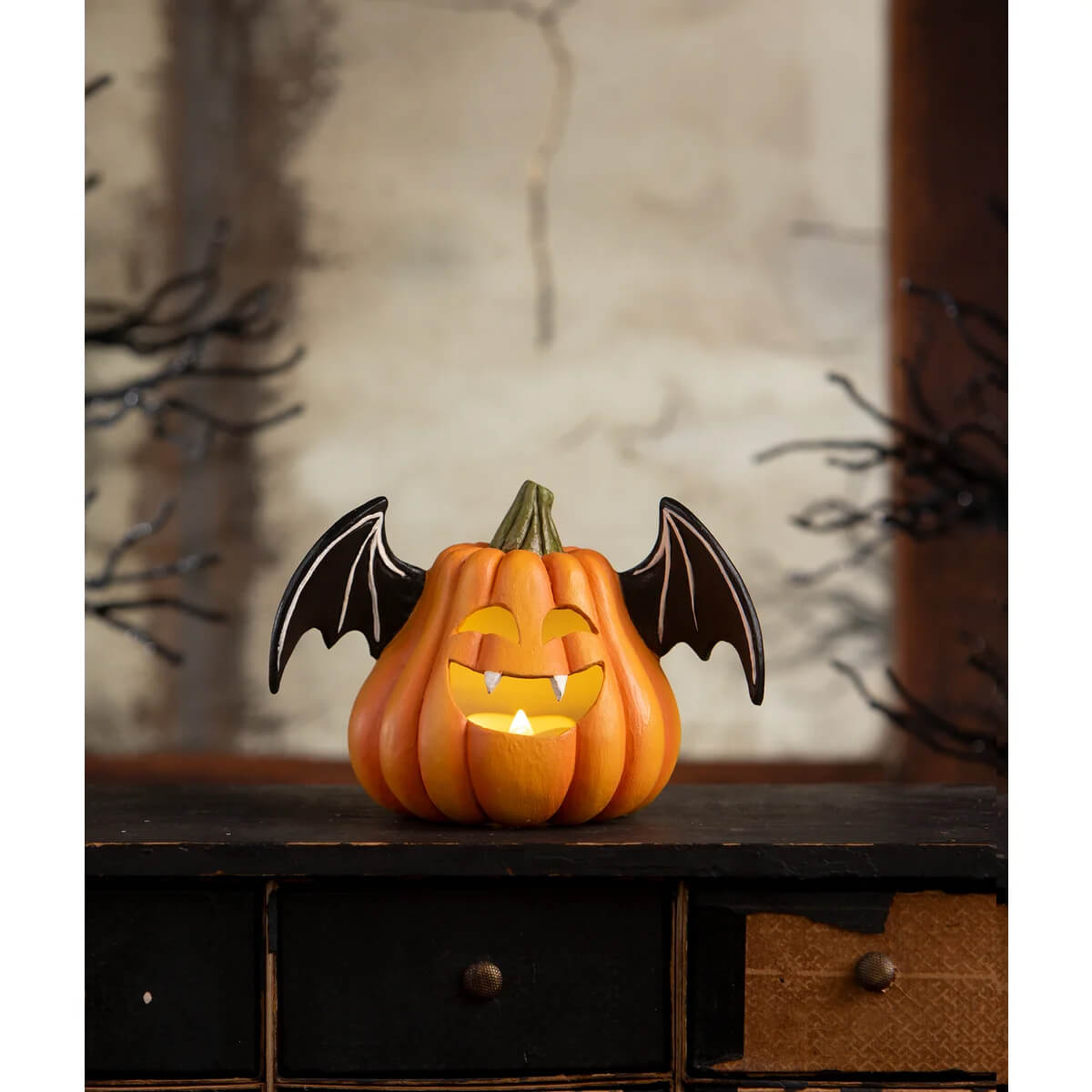 Orange pumpkin bat luminary with black wings hand-painted resin glowing candle inside bethany lowe design