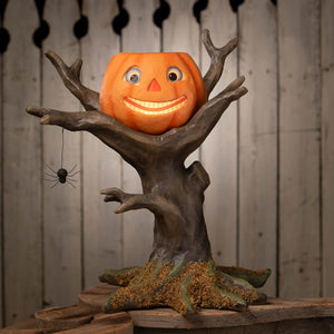 Orange pumpkin lantern with happy haunting tree base and hanging spider figural decor by bethany lowe designs
