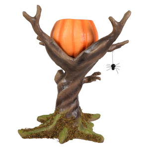 Orange pumpkin-shaped candle holder with brown tree branches green mossy base and black spider happy haunting tree decor by bethany lowe designs