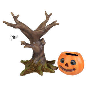 Orange pumpkin-shaped candy bucket with black eyes smiling teeth featured in bethany lowe designs figural decor for happy haunting tree