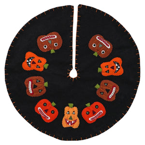 Black felt halloween circle tree skirt with embroidered orange and brown pumpkins featuring stitched faces and green stems