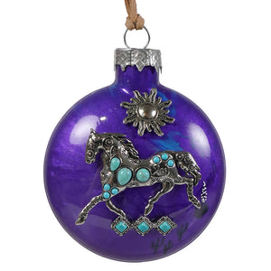 Purple glass ornament features a silver horse with turquoise stones and a matching sun design for bette day decor