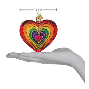 Vibrant rainbow heart ornament with glossy glass finish and gold loop perfect as a glittered heart ornament