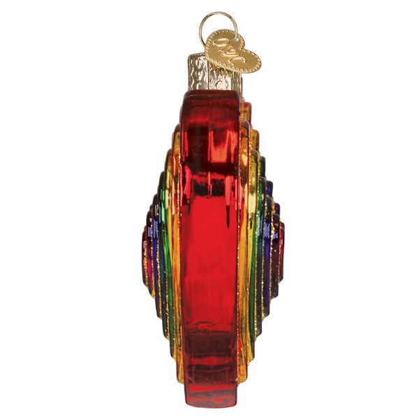 Vibrant red glass rainbow heart ornament with concentric layers and a gold pink glittered heart tag perfect for holiday decor