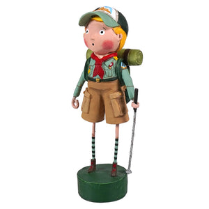 A whimsical ranger rick figurine of a boy scout in green and brown uniform with red scarf on dark green base by lori mitchell patriotic figures