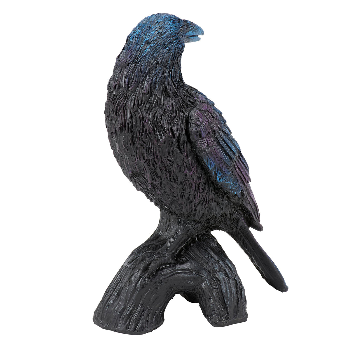 A glossy black and iridescent blue raven figurine with gothic charm perched on a textured tree branch base