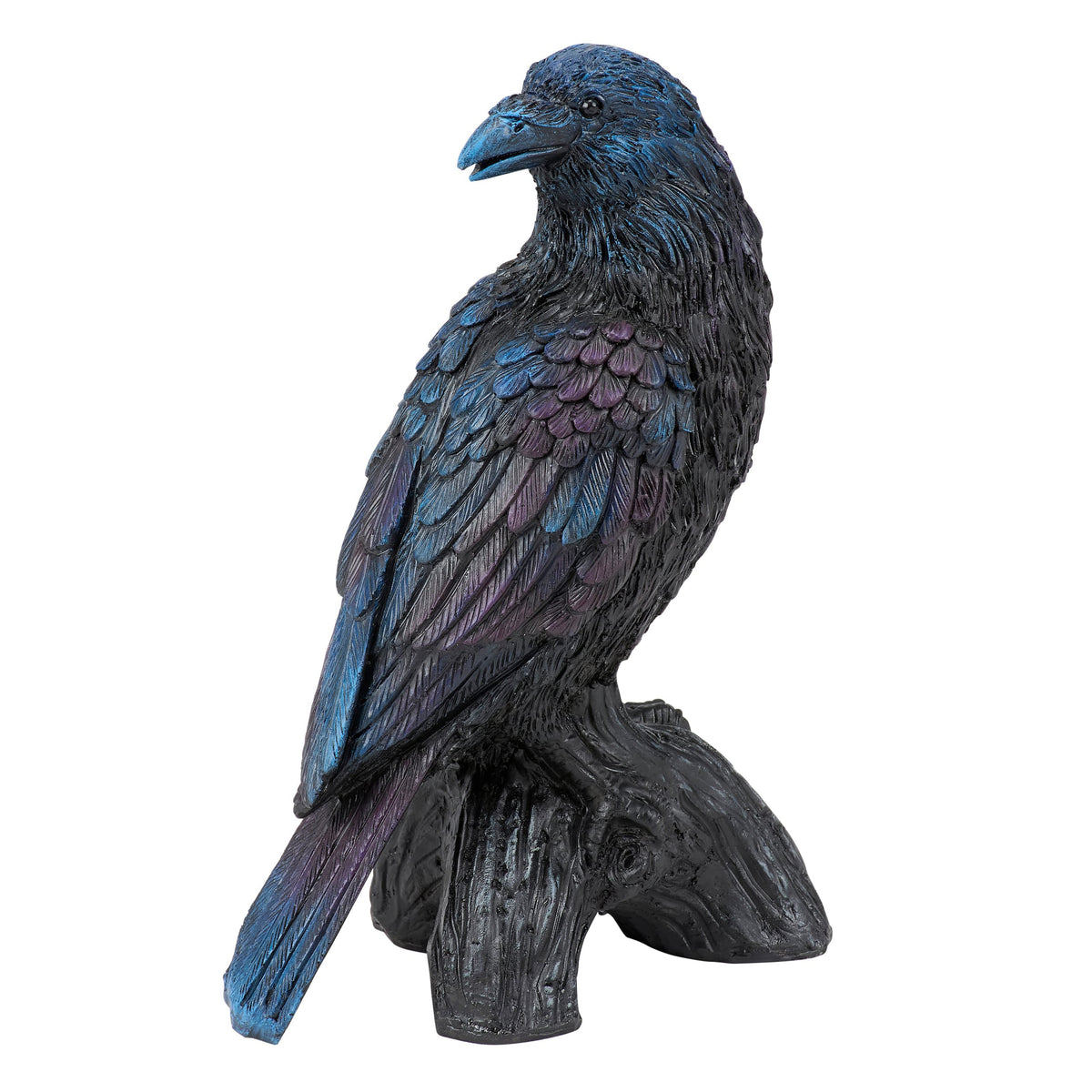 A detailed iridescent blue and black raven figurine with gothic charm perched on a textured tree stump base