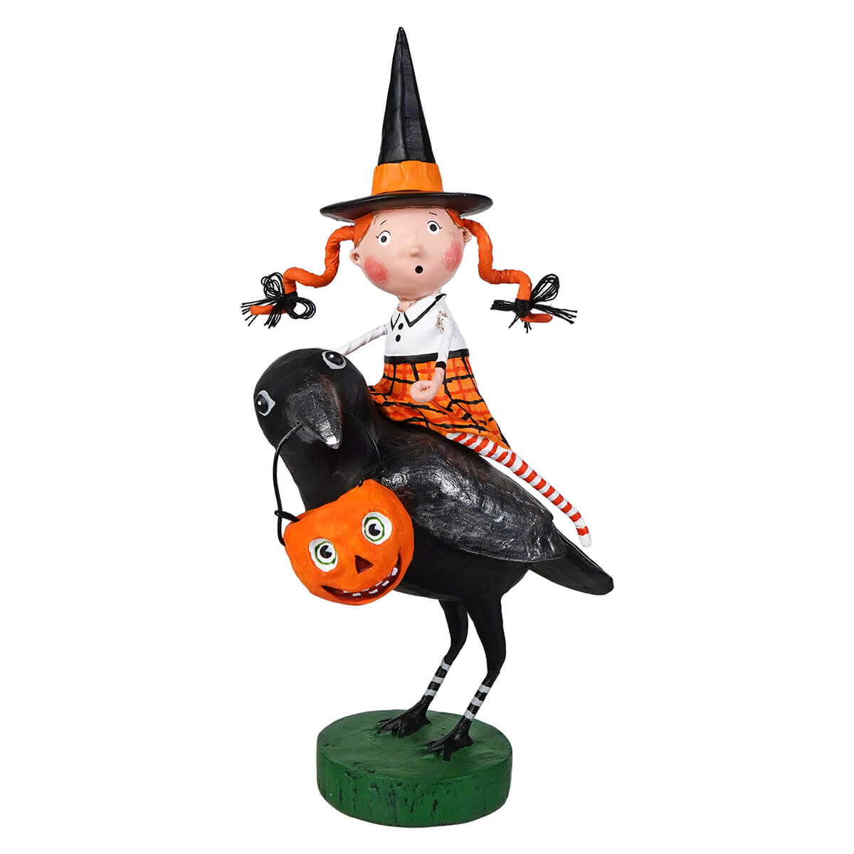 A lori mitchell halloween whimsical resin figurine featuring a young witch with orange pigtails riding a black crow raven’s flight