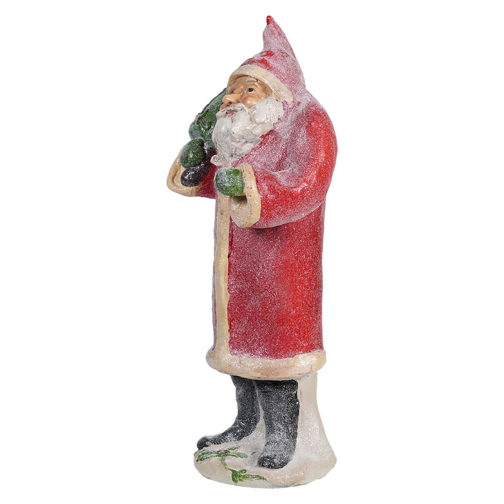 Red Santa Holding Christmas Tree