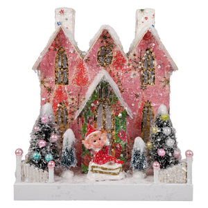 Pink glittery retro elf adobe christmas village house figurine with gold foil windows and snow dusted roofs by cody foster with light cord