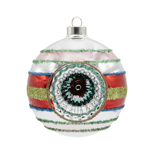 A festive retro reflector round ornament with a red and gold eye design perfect as a sparkling saturn round ornament