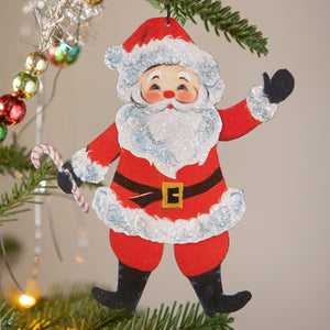 Retro rockin santa ornament by bethany lowe design featuring red and white glittery santa with candy cane and black boots