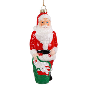 Retro santa blow mold glass ornament red and white with black belt holding green sack candy canes cody foster ornament